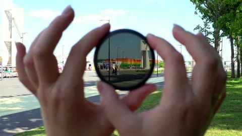 View of a beautiful multi-colored building through round tinted glass. Stock-Footage 201097252