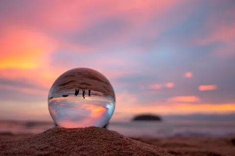 View of beautiful nature at the beach inside crystal ball. Stock Photos