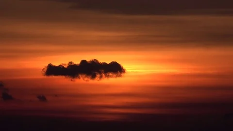 View of beautiful orange sky at sunset dark clouds skyscape natural environment Stock Footage 81972654