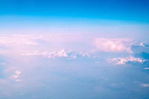 View of beautiful pink clouds in the sky, natural background, view from plane Stock Photos