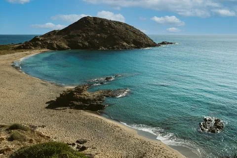 View of beautiful pristine Sa Mesquida beach in Menorca island in Spain, empt 写真素材