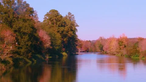 View of a beautiful river in the southern Fall and clear skies Stock Footage 143603900