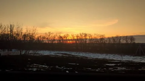 View of the beautiful spring sunset from the car window Stock Footage 282644294