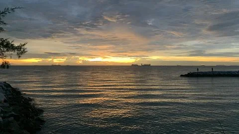 View of Beautiful sunset on beach background Stock Photos