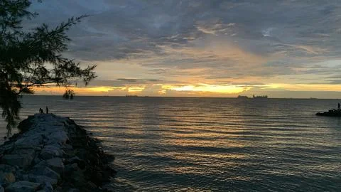 View of Beautiful sunset on beach background Stock Photos