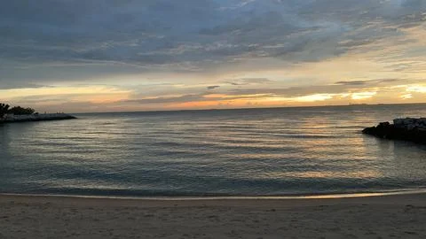 View of Beautiful sunset on beach background Stock Photos