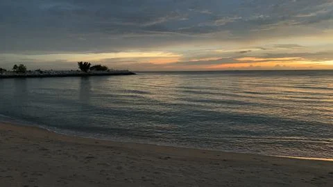 View of Beautiful sunset on beach background Stock Photos