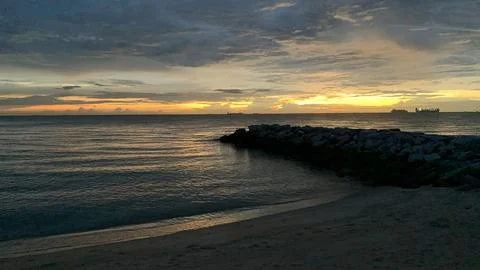 View of Beautiful sunset on beach background Stock Photos