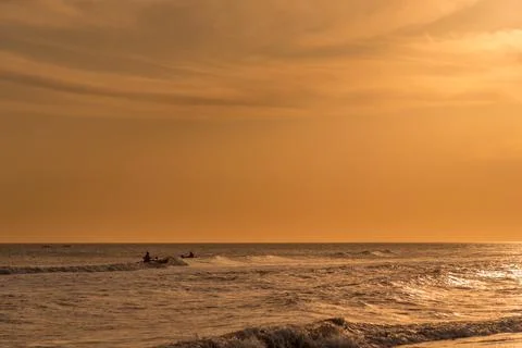 View of a beautiful sunset on the beach. Stock Photos