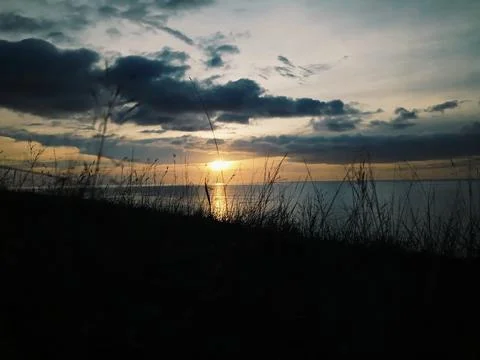 View of beautiful sunset on the beach Stock Photos
