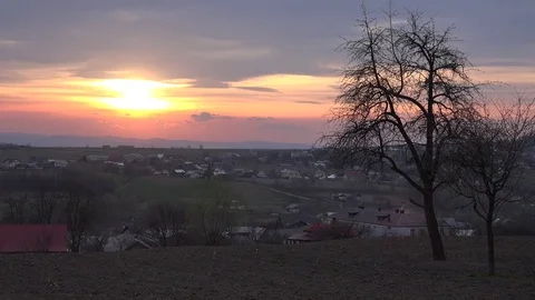 View of beautiful sunset over mountain village in spring season countryside land Stock Footage 81972220