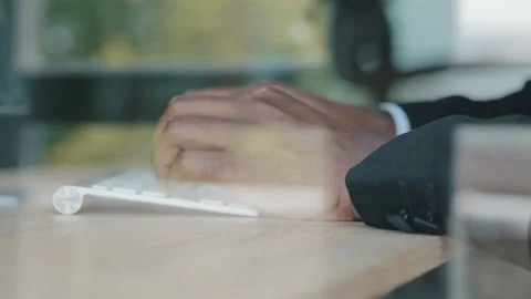 View behind glass unknown afro businessman leader boss programmer IT specialist Stock Footage 208148186