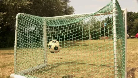 View behind the goal with the ball thrown HIGH 스톡 동영상 253703929