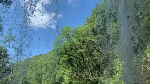 View from behind Sgwd yr Eira waterfall in Brecon South Wales Stock Footage 159713530