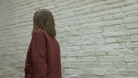 View from behind young female going un the stairs. Slow motion high resolution Видео 121739357