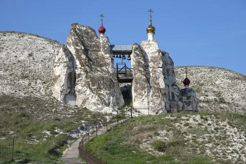 View on the bell tower of the ancient cave temple. Kostomarovsky convent Stock Photos