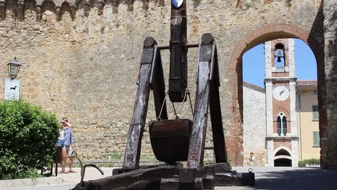 View of the bell tower of St quirico d'Orcia, Tuscany, Italy Stock Footage 76599773