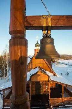 View of the bells and the dome of a small rural church in the village of Uval Stock Photos