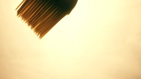 View from below as a cooking brush smears ketchup with herbs for cooking steak Stock Footage 122618876
