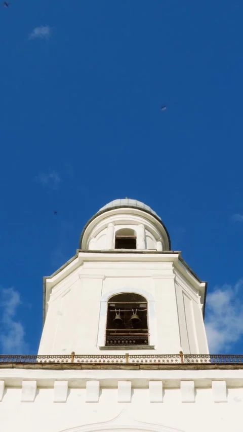 A view from below of the high bell tower of the Orthodox Church. Stock Footage 293138084