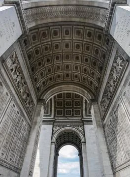 View from below of the internal arches of the Arc de Triomphe in Paris. Stock Photos
