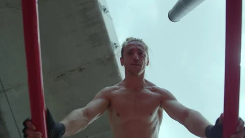 View from Below of Muscular Man Doing Push Ups on Parallel Bars Video stock 260048643
