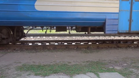 A view from below on the railway and freight train in motion Stock-Footage 106082655