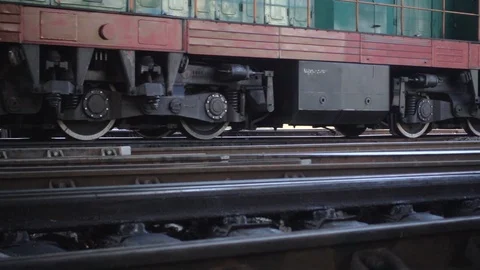 A view from below on the railway and freight train in motion Stock Footage 106082729