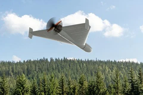 View from below of a Russian army combat drone ‘Shahid’ against a forest backgro Stock Photos