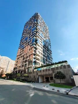 View from below of a skyscraper with a non-standard appearance Stock Photos