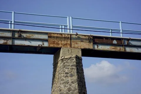View from below of a small bridge over Yeh Unda dam in Klungkung, Bali Stock Photos