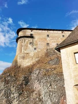 View from below of stone wall of medieval castle Stock Photos