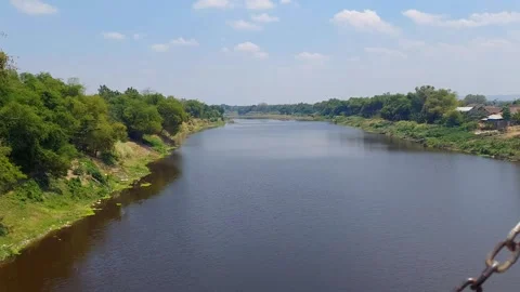 View of the Bengawan River from the Bridge in Bojonegoro 4K Stock Footage 318866166