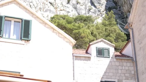 View between historic stone buildings and structures. Stock Footage 303848160