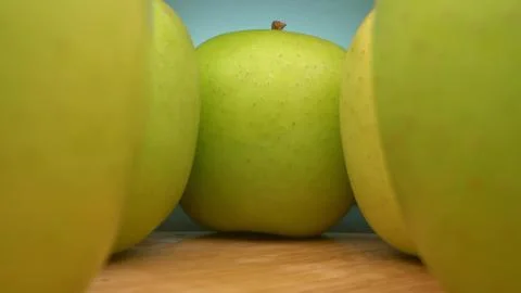 View between rows of green apples. super close up. Stock Illustration