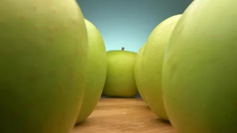 View between rows of green apples. super close up. Stock Illustration