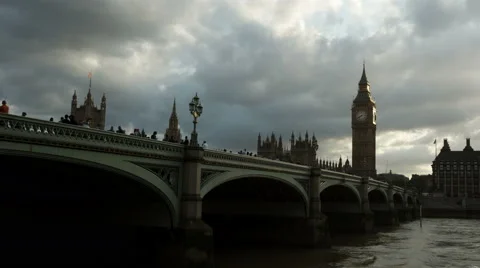 View of Big Ben, Westminster Bridge, the Thames, London. Evening, walking people Stock Footage 56561611