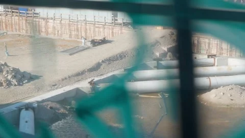 View of big construction site from train, graffiti, slow motion Stock Footage 305912240