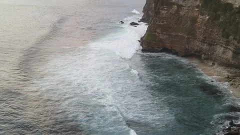 View on big ocean waves , Uluwatu Temple at the Bali island, Indonesia. Stock Footage 149419355