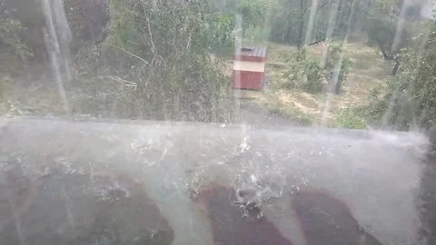 View of the big pouring rain from the window. Stock Footage 154230531