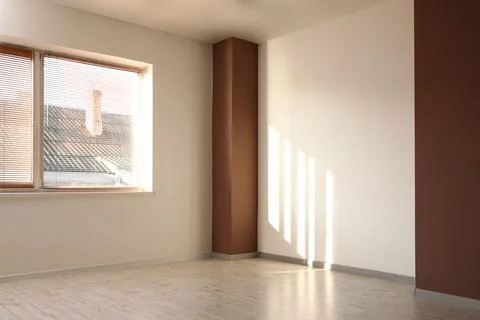View of big stylish empty room with window Stock Photos
