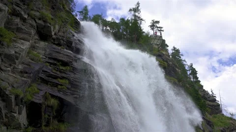 View of big waterfall in alps mountains river in Austria nature Stock Footage 299301275