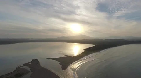 View from bird flight over the ocean and the island of Sakhalin Stock Footage 54107541
