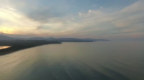View from bird flight over the ocean and the island of Sakhalin Stock Footage 54107820
