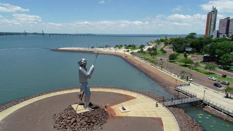 A view of bird flying over the waterfront of posadas misiones Argentina 動画素材 156192045