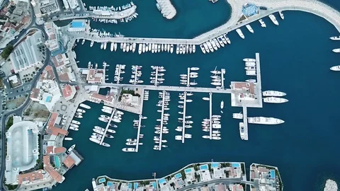View from birds eye to the dock with the white yachts in Limassol, blue water Video stock 121618644
