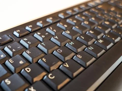 View of the black keyboard from the PC, white background Stock Photos