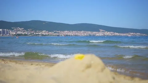 View of the Black Sea with sandy beach and distant mountain range, showcasi.. Stock Footage 293485402