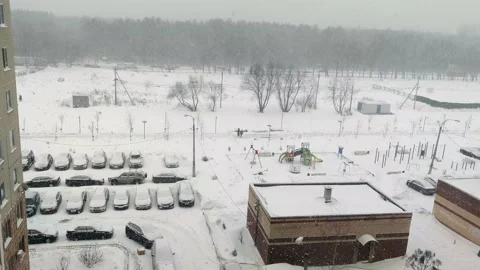 View on blizzard from residential building window Stock Footage 230956382