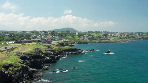 A view of the blue and clear coast of Jeju Island and the horizon. Stock Footage 247116311